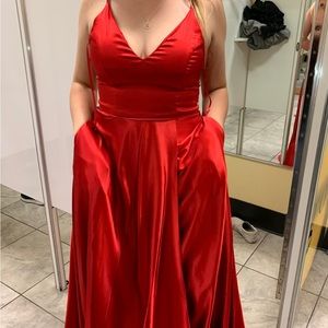 Red prom dress with pockets. Size medium